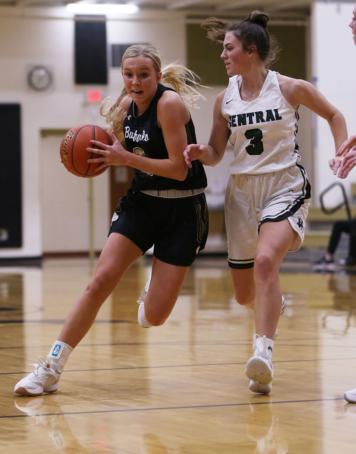 Kendall Tietjen works her way to the basket